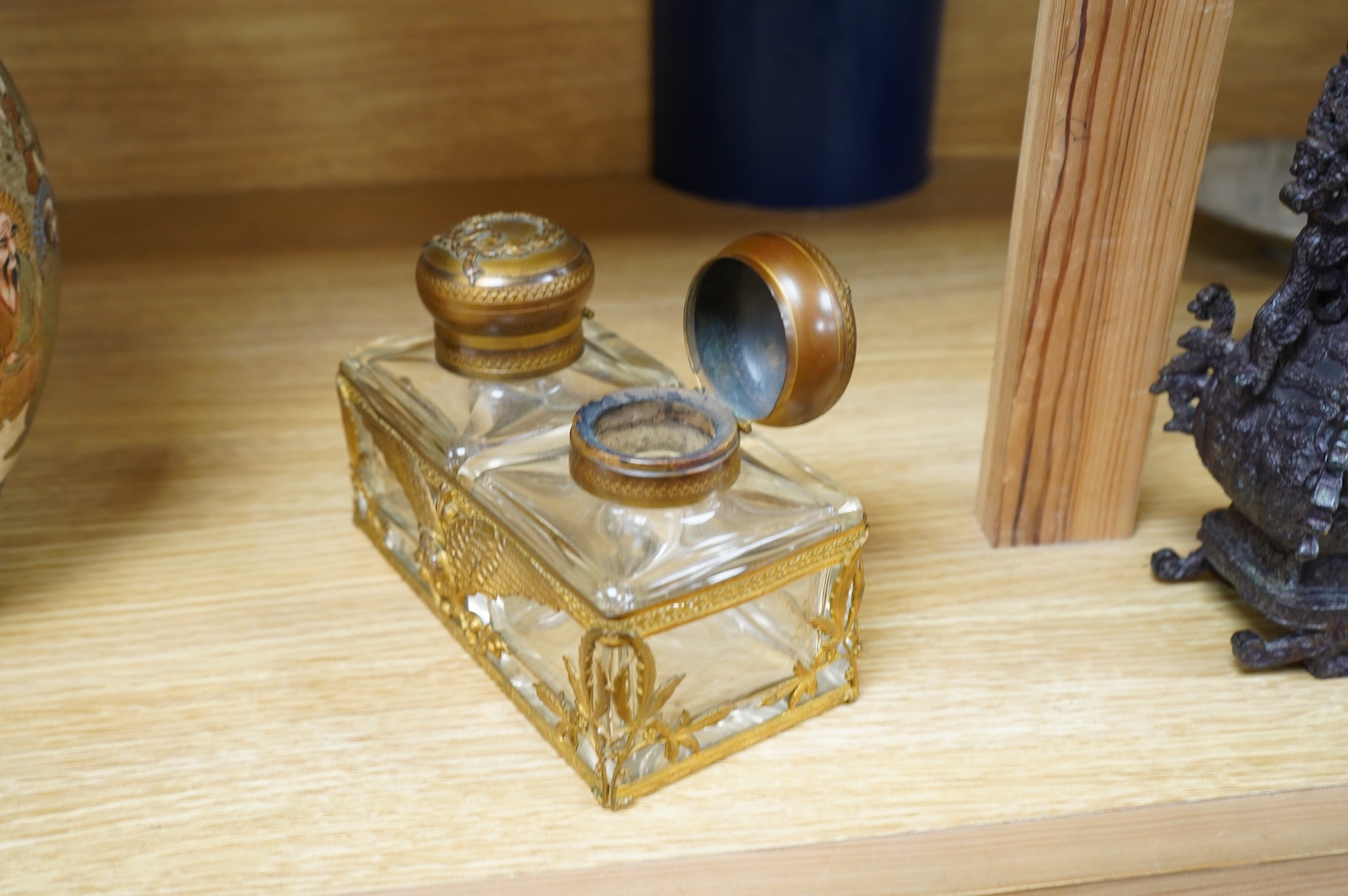 A late 19th/early 20th century French Empire style gilt brass double inkwell, 15cm wide